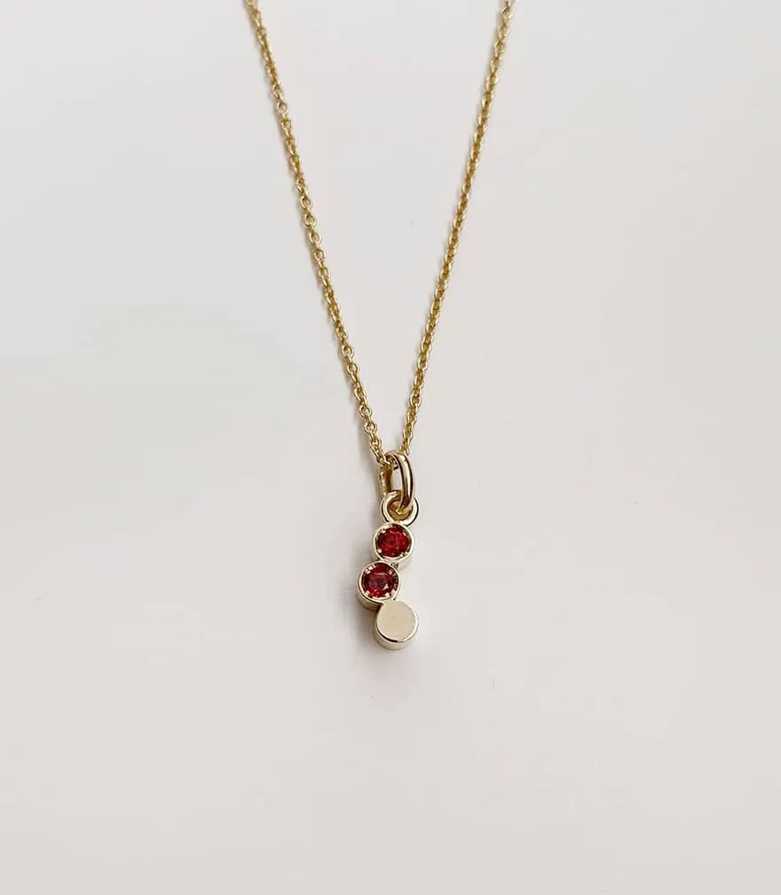 Coralie Grzes | Sofia Amulet of January 18K Gold Necklace w. Garnets